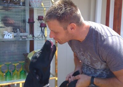 Author Stephen with his dog Fia giving him a big kiss