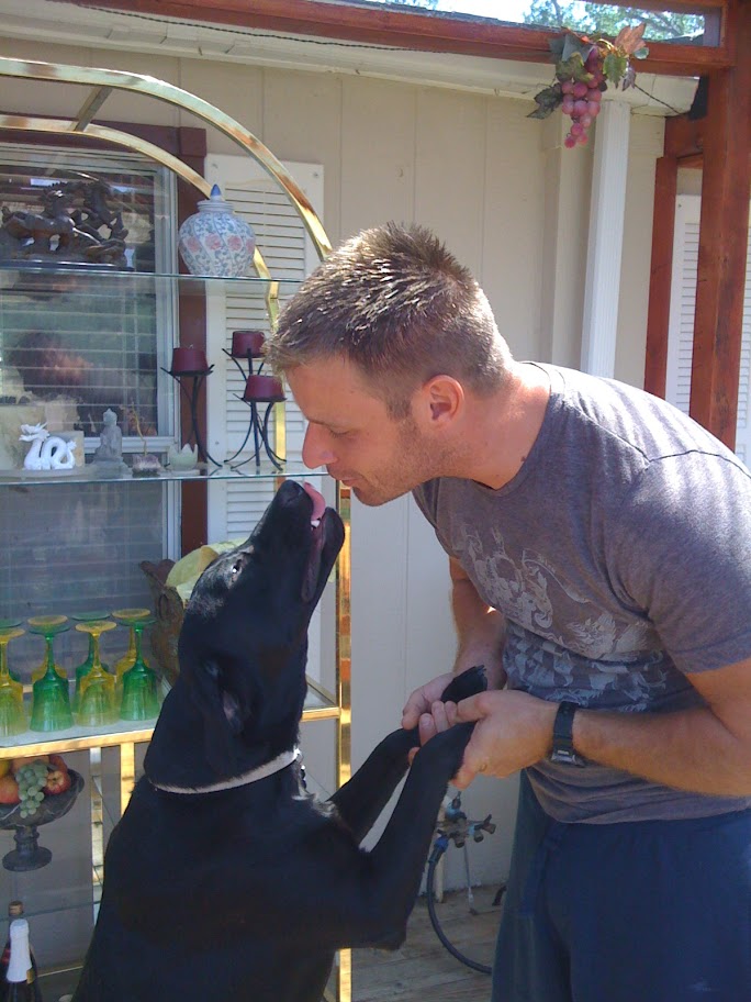 Author Stephen with his dog Fia giving him a big kiss